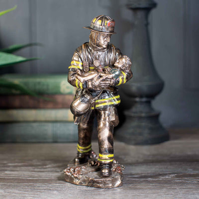 Fireman Carrying A Child Statue - Creations and Collections
